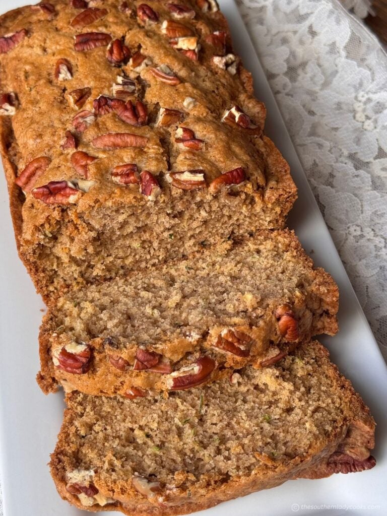 The Best Zucchini Bread sliced on a plate