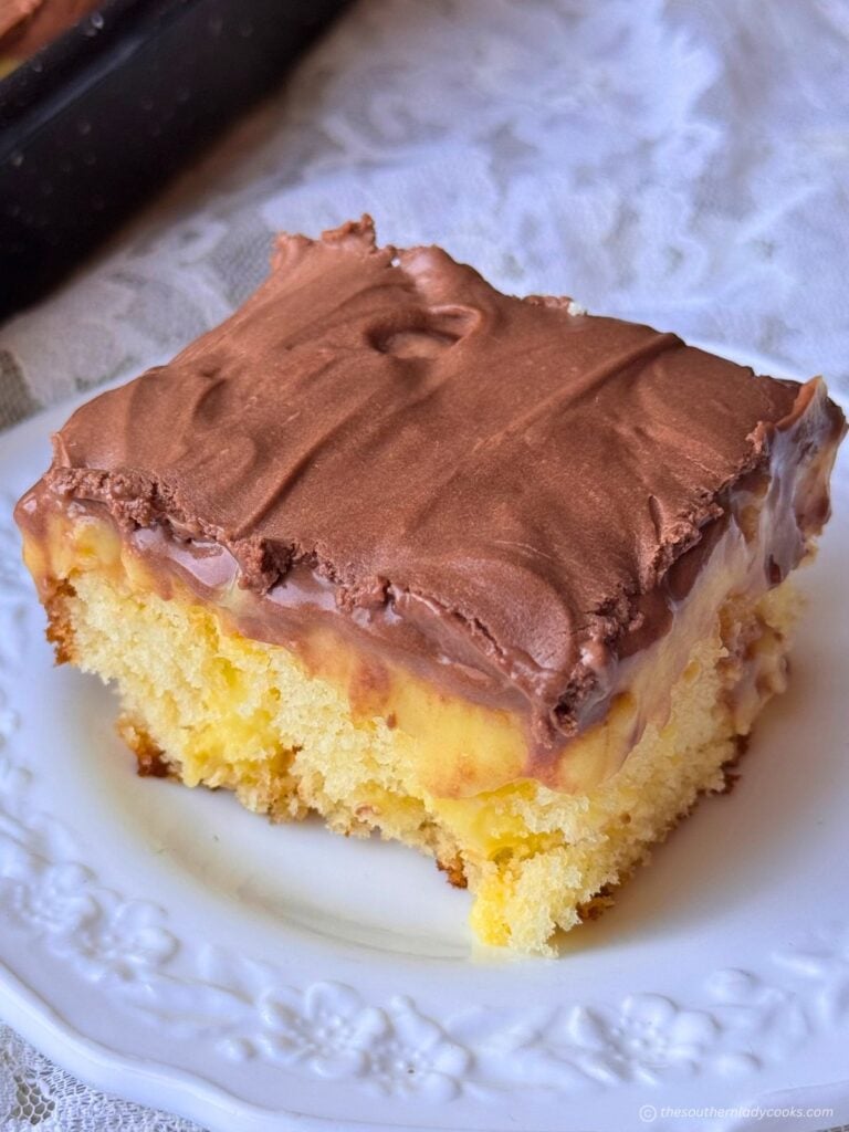 Piece of Boston Cream Poke Cake