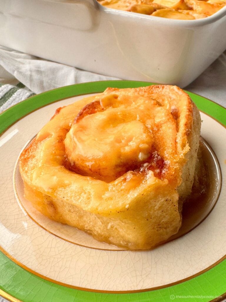 Orange Cream Cinnamon Roll on plate
